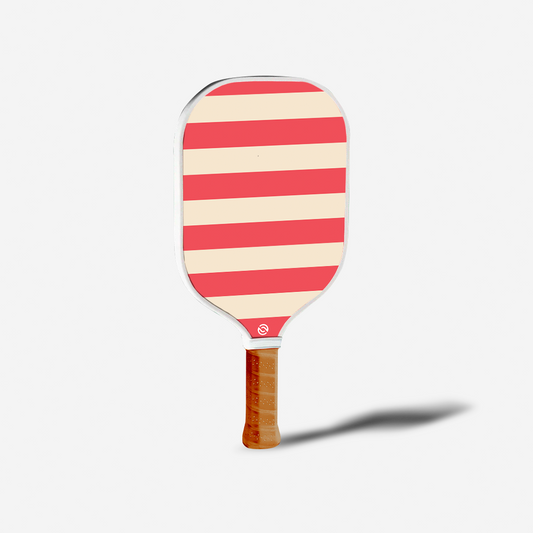 Striped paddle with wooden handle on a white background